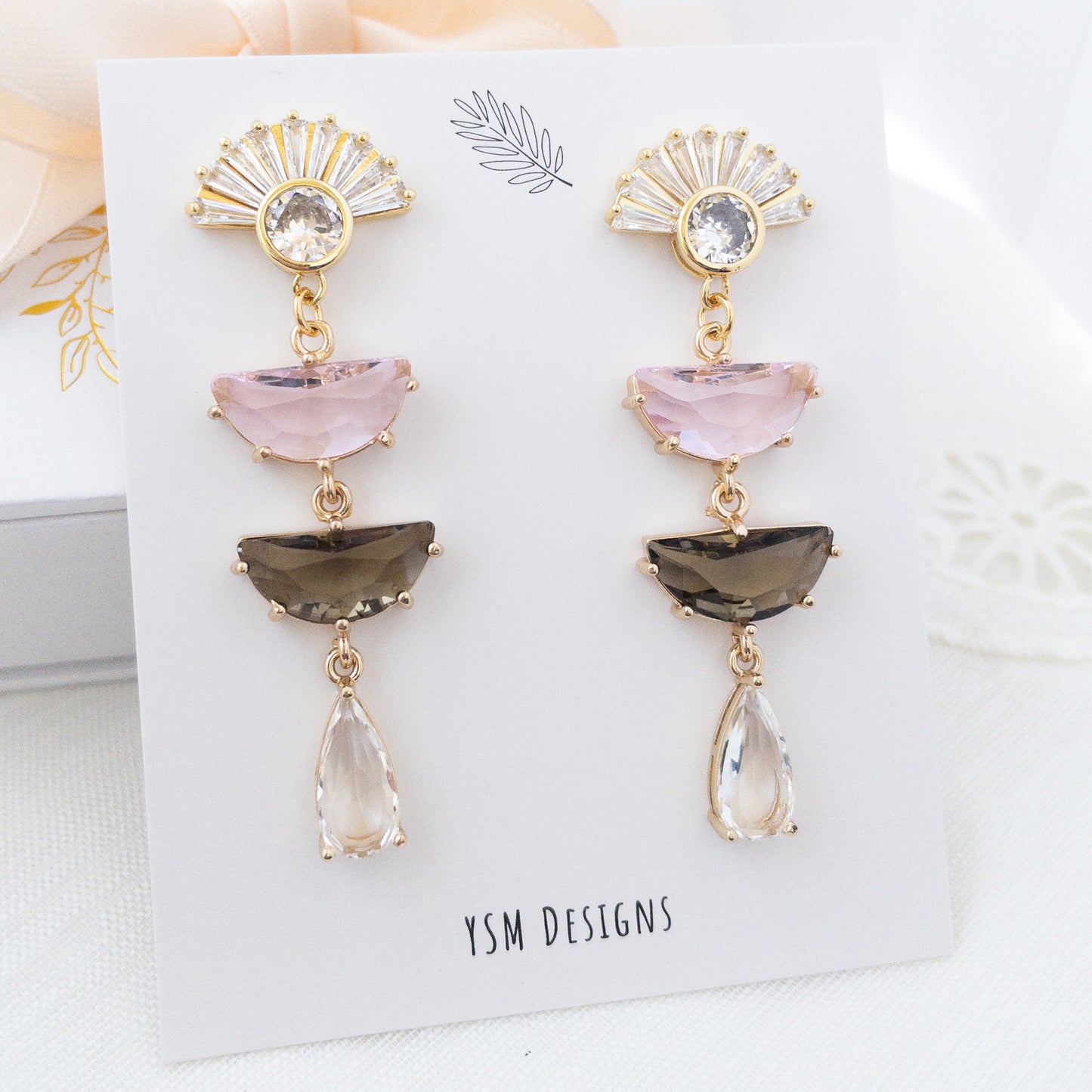 Vintage style statement earrings on a white necklace card by YSM Designs