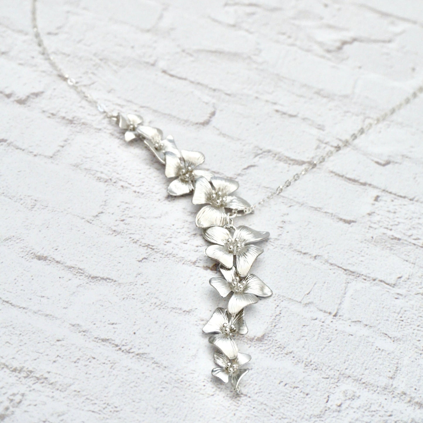Silver Asymmetrical Dogwood Necklace