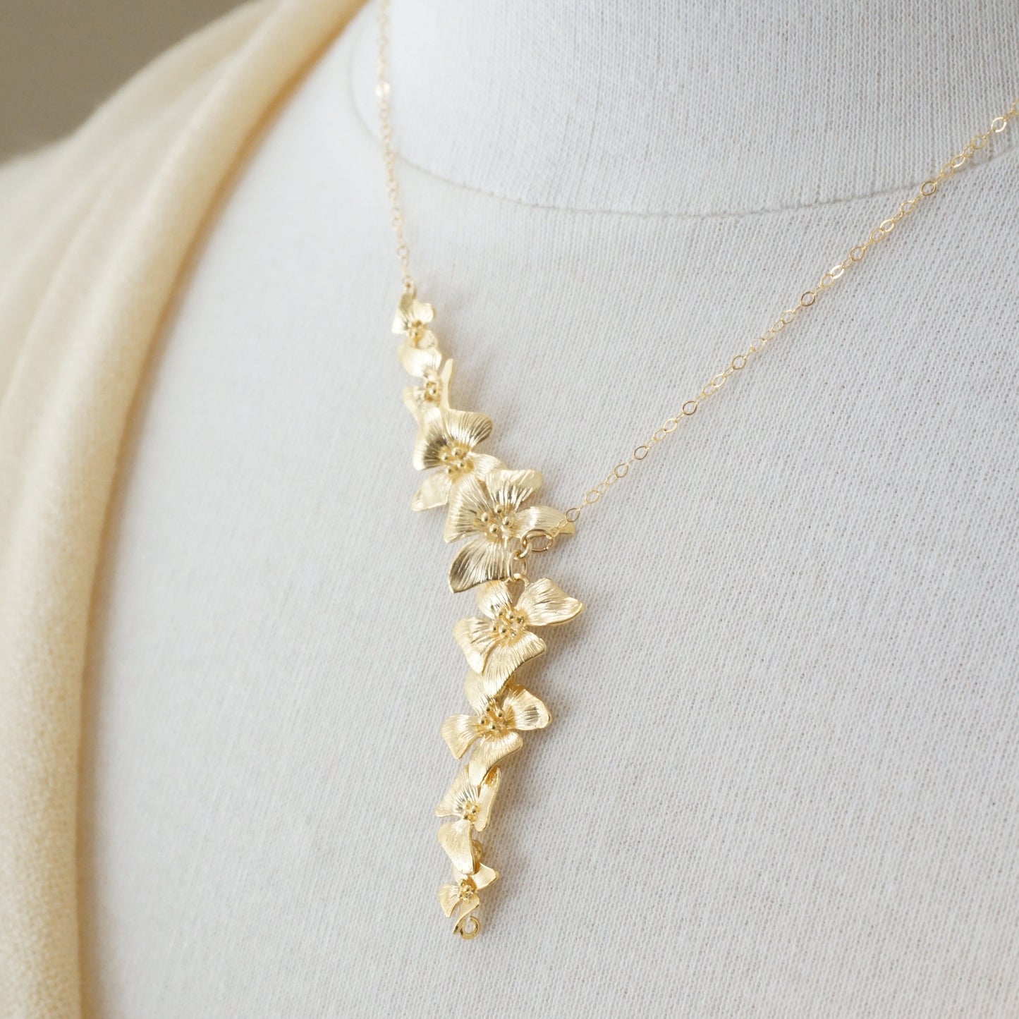 Asymmetrical dogwood necklace