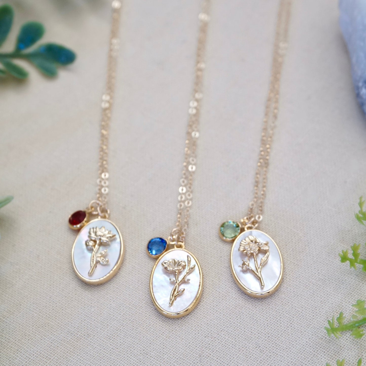 Gold birth flower jewelry