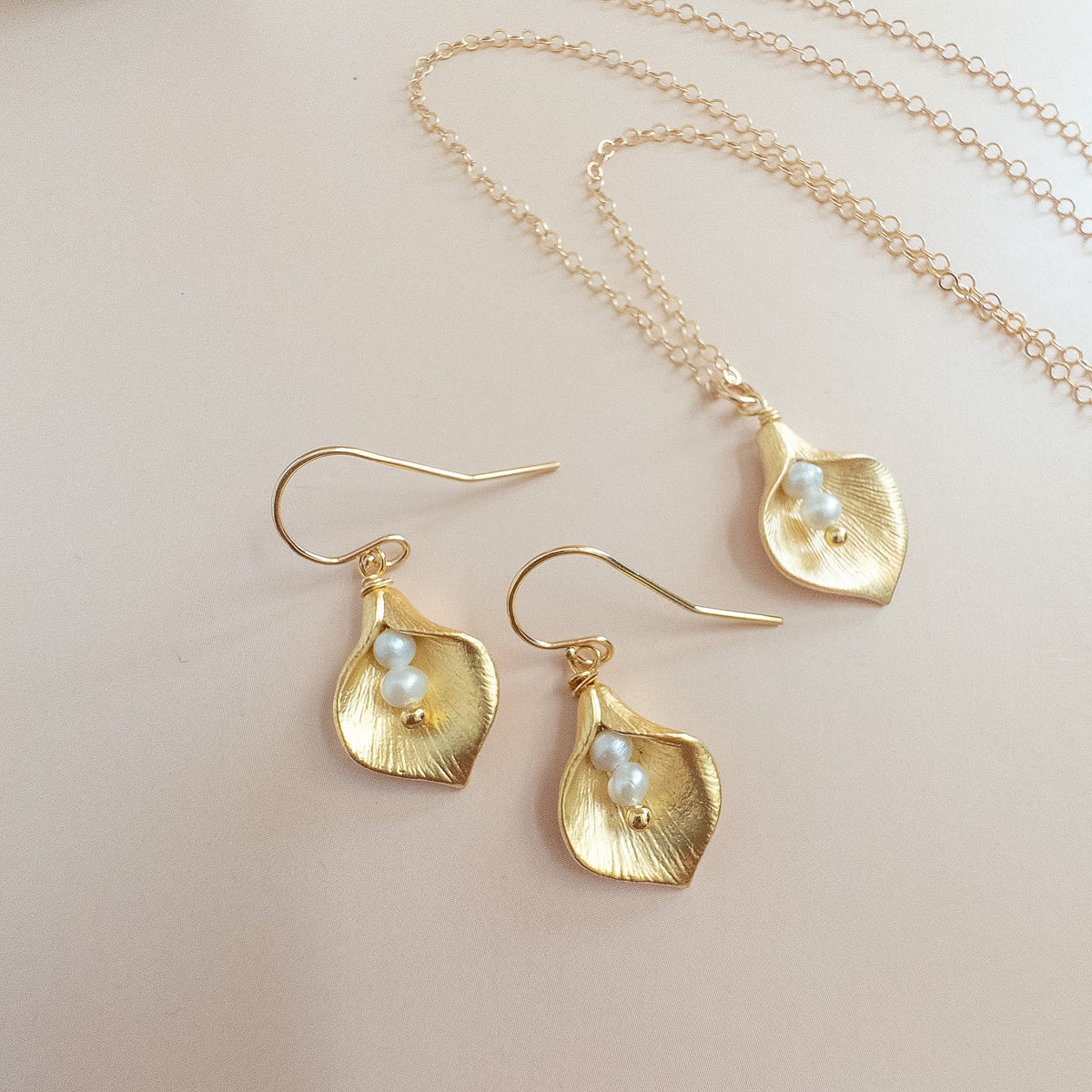calla lily necklace and earring set shown together