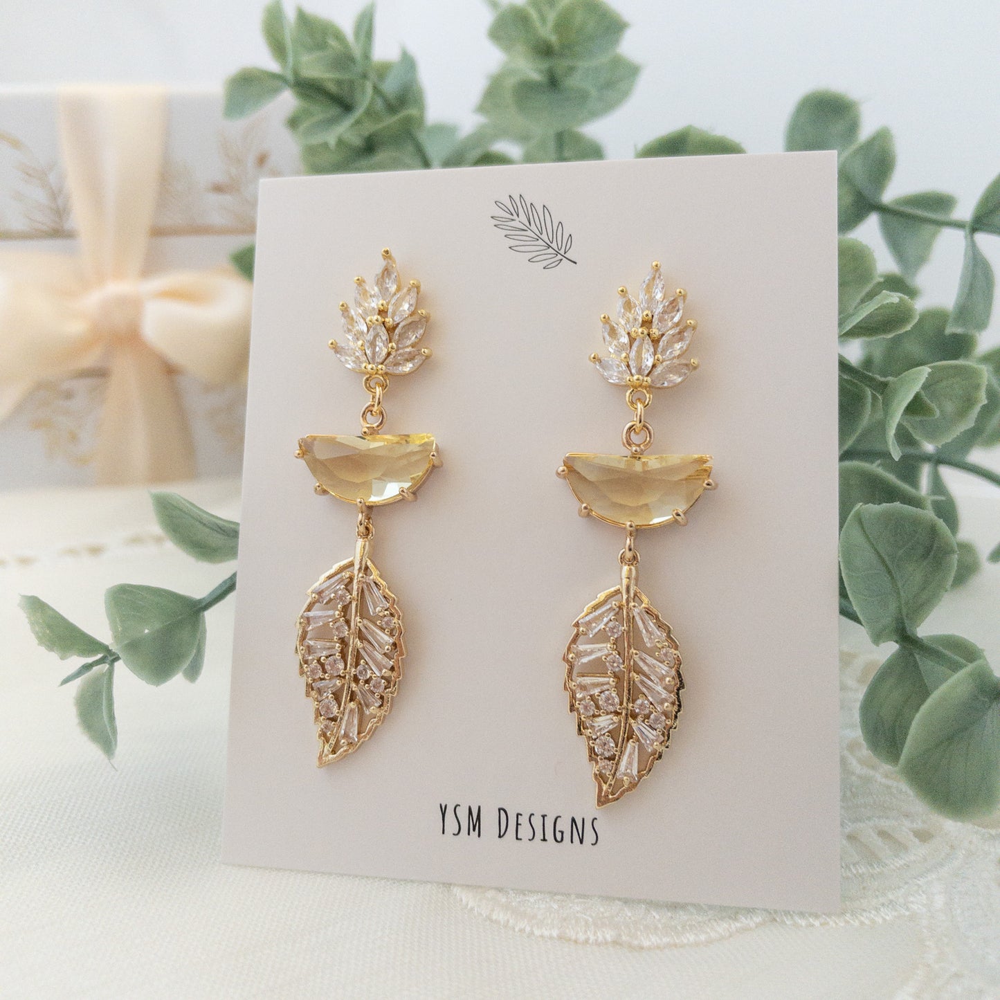 Leaf earrings with leaf crystal posts, yellow stones and leaf cyrstal dangles by YSM Designs