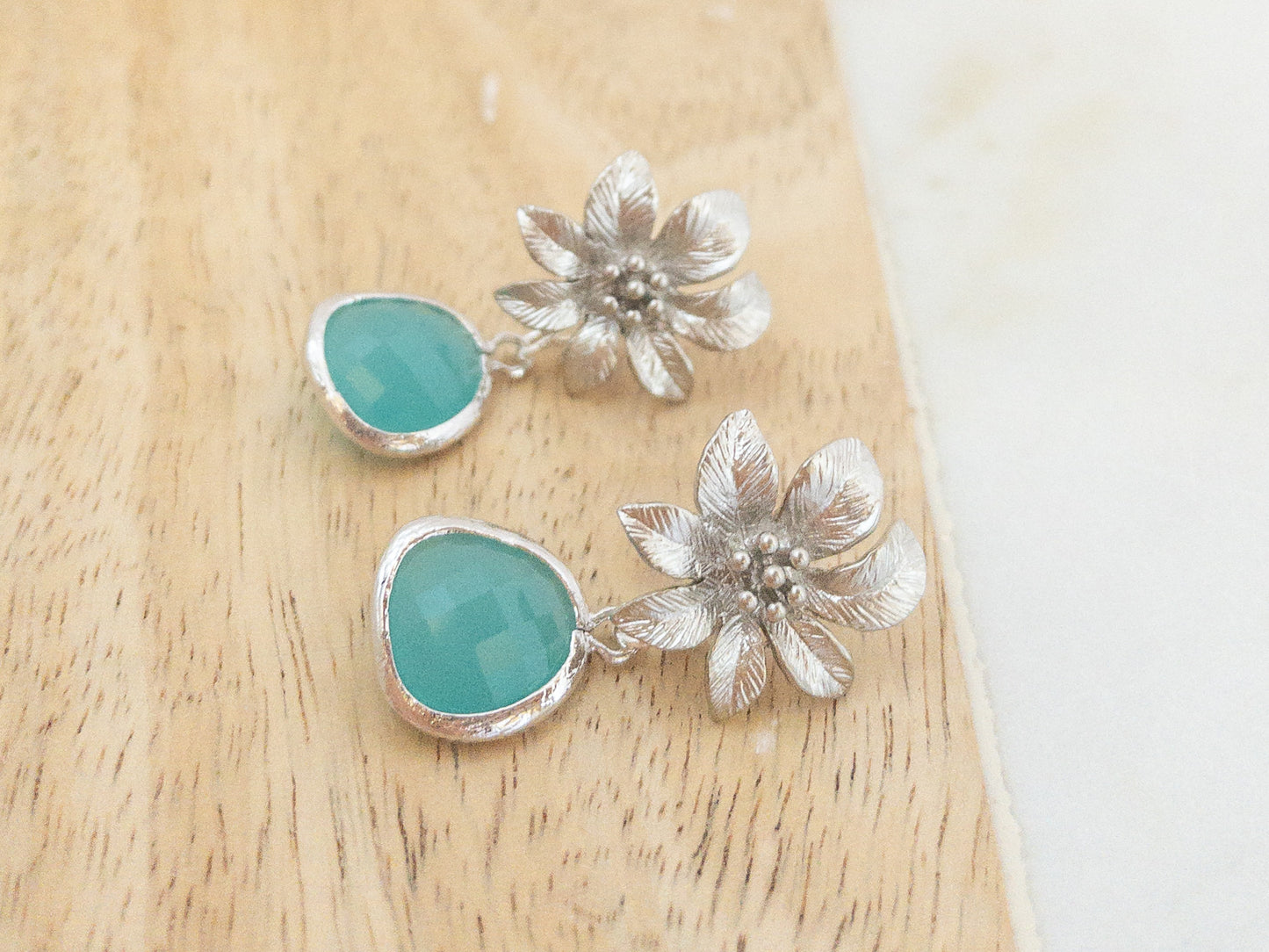 Silver Clematis Flower Earrings with Blue Crystals