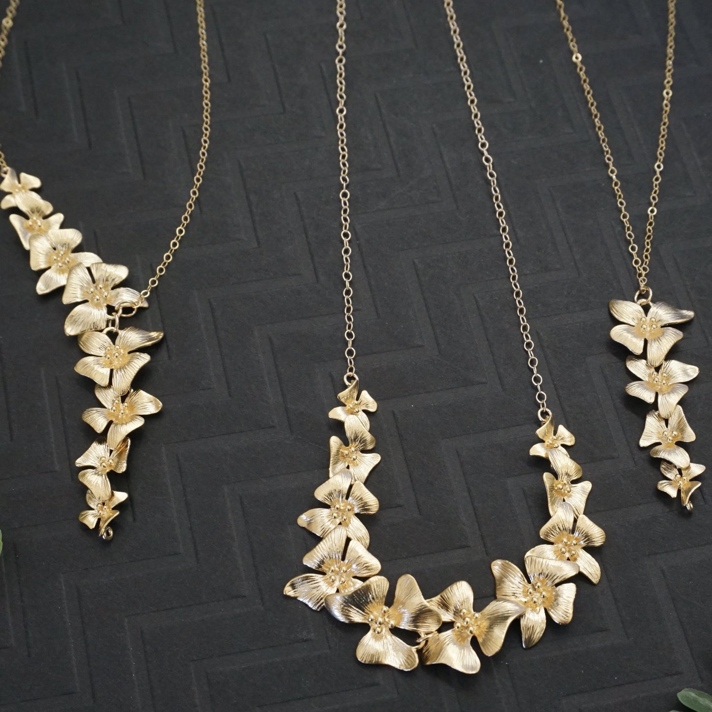 3 different styles of dogwood necklace