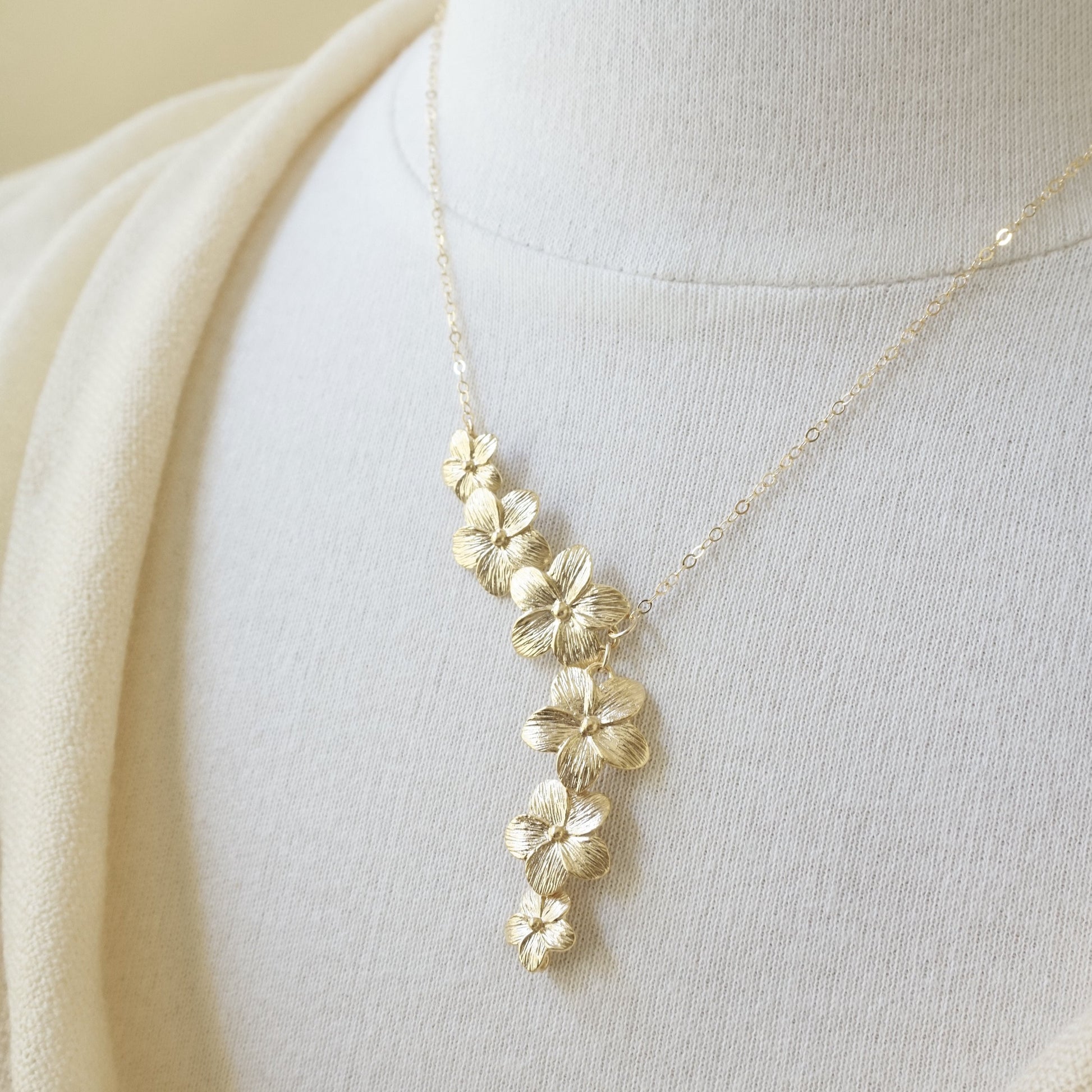 Asymmetrical flower necklace