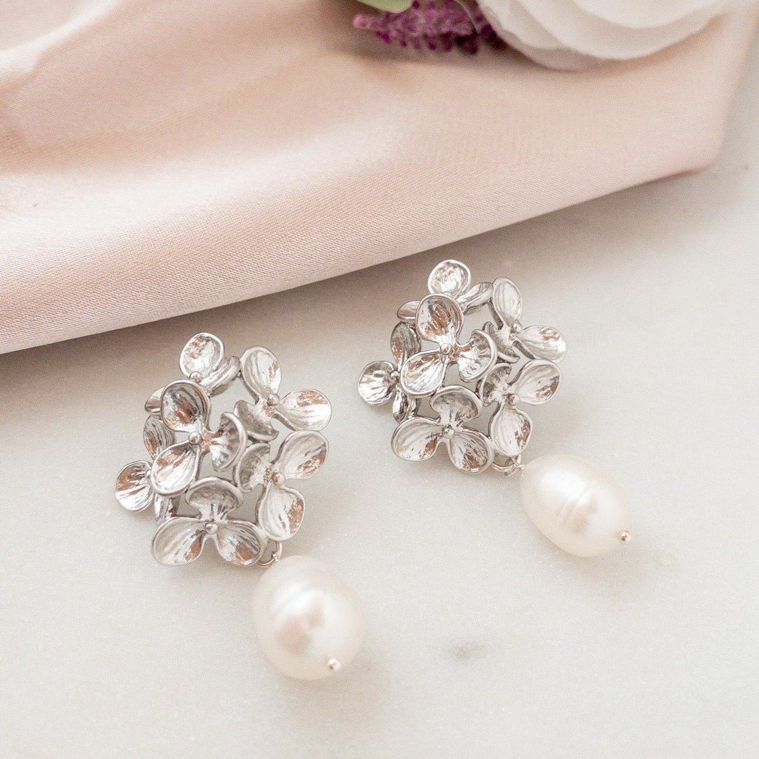 Silver floral earrings with freshwater pearls
